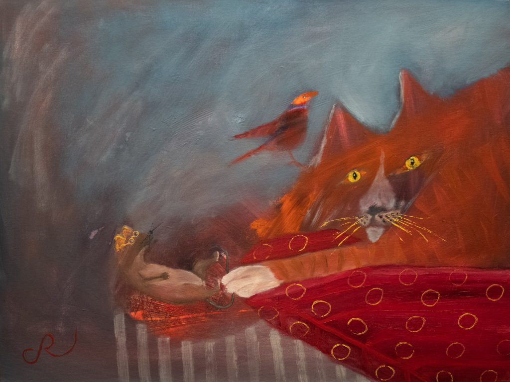 cat on red pillow